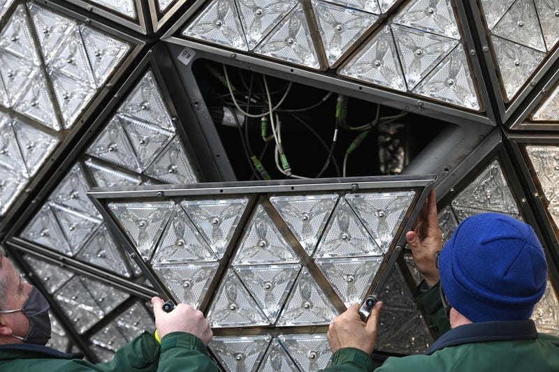 Landmark electricians Chris Sisti and Nick Bonavita demonstrate the installation of a Waterford crystal panel onto the Times Square New Year’s Eve ball, New York, NY, December 27, 2020. 