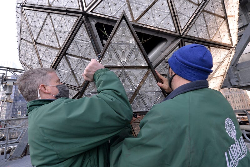 Landmark electricians Chris Sisti and Nick Bonavita demonstrate the installation of a Waterford crystal panel onto the Times Square New Year’s Eve ball, New York, NY, December 27, 2020.