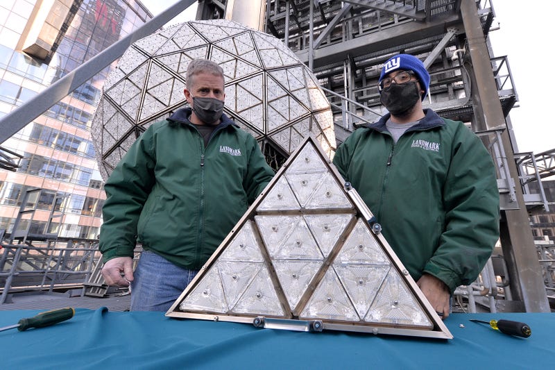 Landmark electricians Chris Sisti and Nick Bonavita demonstrate the installation of one of 192 Waterford crystals into a panel that will be placed on the Times Square New Year’s Eve ball, New York, NY, December 27, 2020. 