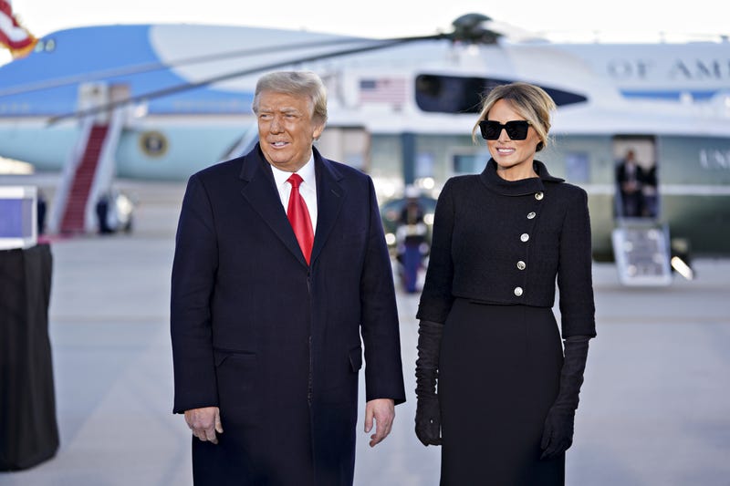 U.S. President Donald Trump, left, and U.S. First Lady Melania Trump arrive to a farewell ceremony at Joint Base Andrews, Maryland, U.S., on Wednesday, Jan. 20, 2021.