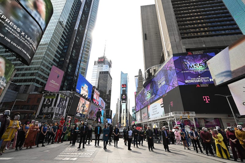 Performers dance and sing during the "We Will Be Back" Broadway Celebration in Times Square, New York, NY, March 12, 2021