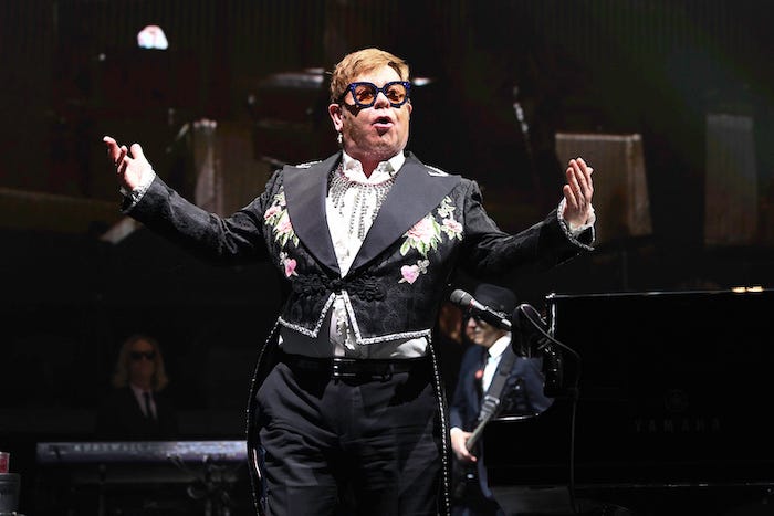 Elton John performing during concert