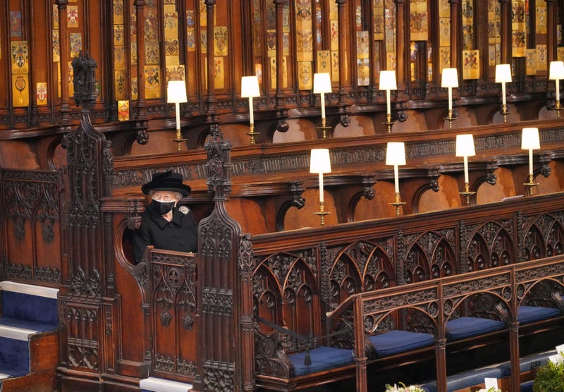 Queen Elizabeth II takes her seat for the funeral of the Duke of Edinburgh in St George's Chapel, Windsor Castle, Berkshire.
