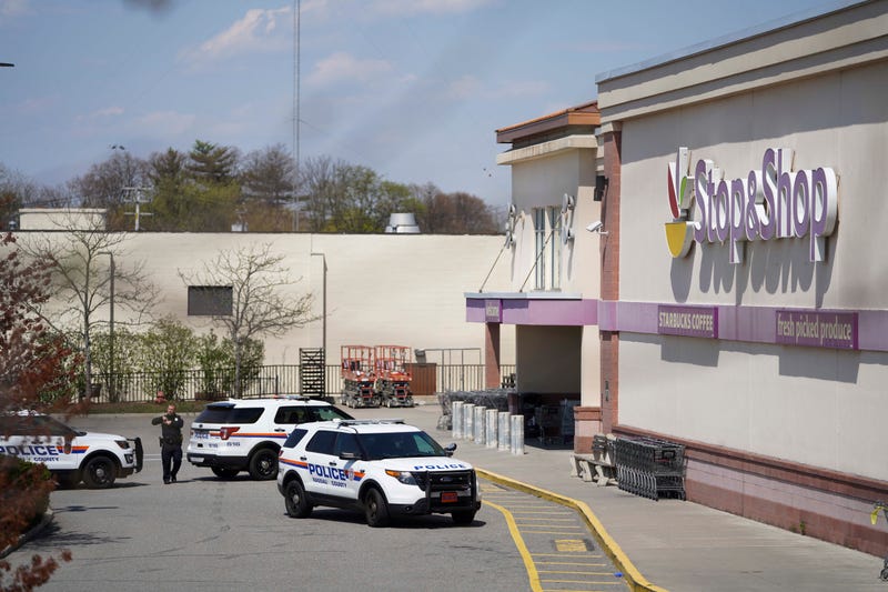 A policeman is seen outside a Stop & Shop grocery store where a shooting took place in West Hempstead, New York, the United States, on April 20, 2021.