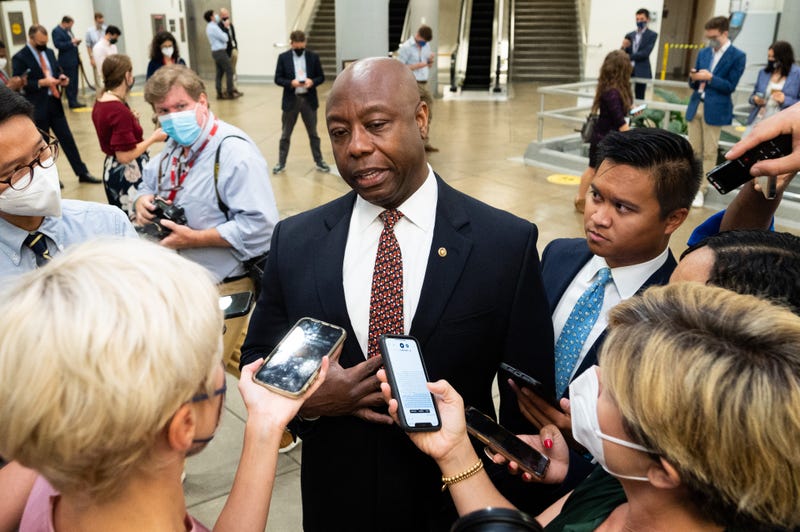 U.S. Senator Tim Scott (R-SC) talking with reporters near the Senate Subway.