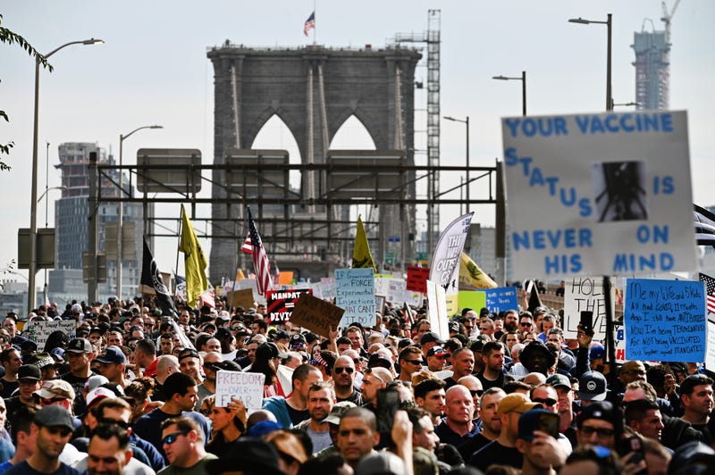 File photo: New York City municipal workers and supporters march across the Brooklyn Bridge during the “Anti-Mandate March For Choice”, New York, NY, October 25, 2021