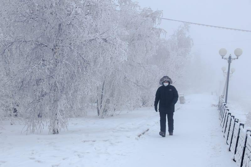 A man walks along the Lena River in Yakutsk.