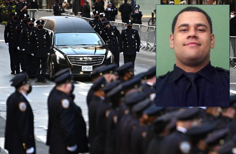A hearse carrying the casket of NYPD Officer Wilbert Mora arrives at St. Patrick's Cathedral for his wake on Feb. 1, 2022. Inset: Officer Mora