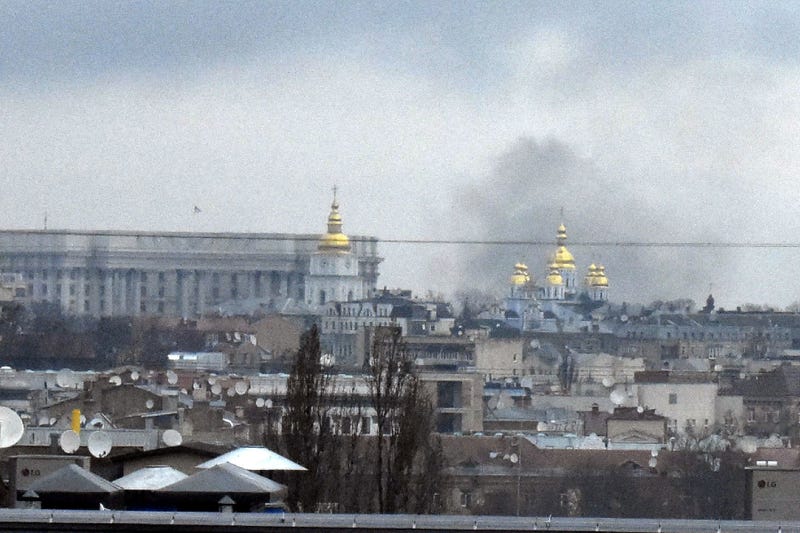 black smoke shooting up into the air in Ukraine's capital Kyiv