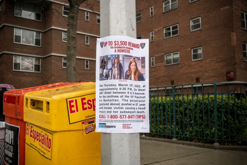 A wanted poster in Chelsea on March 17, 2022, offers a reward for the arrest of a suspect in the shoving death of Barbara Gustern