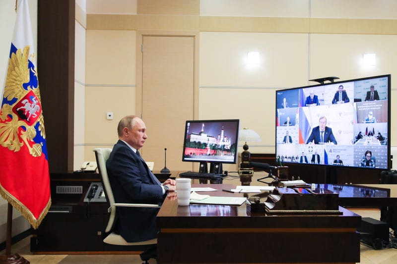 Russian President Vladimir Putin is seen in his office in the Novo-Ogaryovo residence during a videoconference meeting of Russian government officials to discuss the development of the air transport and aircraft industry in Russia on March 31, 2022