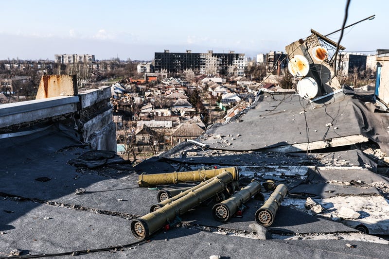 Shell fragments are seen on a rooftop in the city of Mariupol.