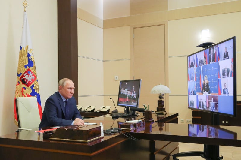 Russian President Vladimir Putin holds a meeting with permanent members of the Russian Security Council via video link from his Novo-Ogaryovo residence on April 7, 2022
