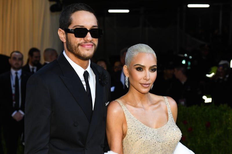 Pete Davidson with Kim Kardashian as she wears Marilyn Monroe’s “Happy Birthday Mr. President” dress while walking on the red carpet at the 2022 Metropolitan Museum of Art Costume Institute Gala celebrating the opening of the exhibition titled In America: An Anthology of Fashion held at the Metropolitan Museum of Art in New York, NY on May 2, 2022.