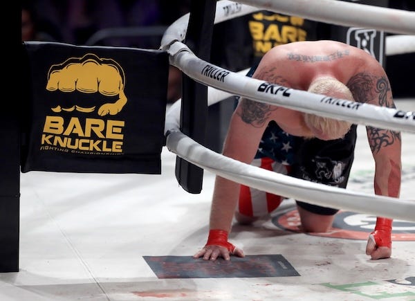 Sam Shewmaker is knocked down during his fight against Mick Terrill at BKFC 27 at OVO Arena Wembley, London