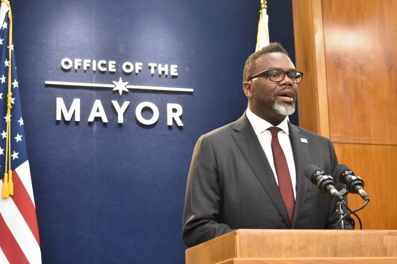 Chicago Mayor Brandon Johnson speaks at a podium.