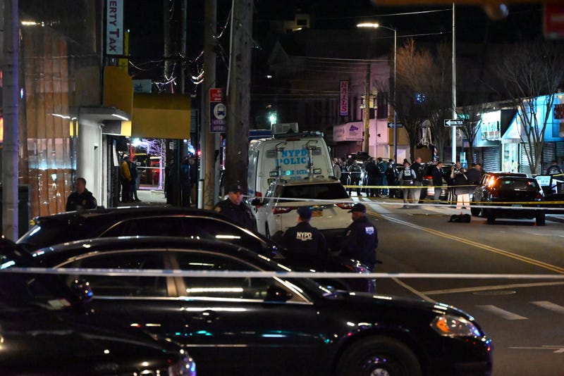 Police investigate at the scene of the shooting on Mott Avenue in Far Rockaway on the night of March 25, 2024