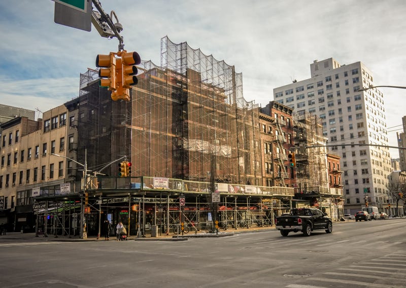 A sidewalk shed and scaffolding in Chelsea in January 2025