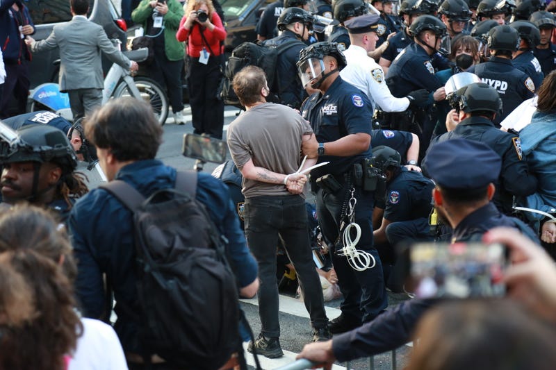 Police officers detain anti-ICE protesters around Federal Plaza Immigration Court in Lower Manhattan on June 10, 2025