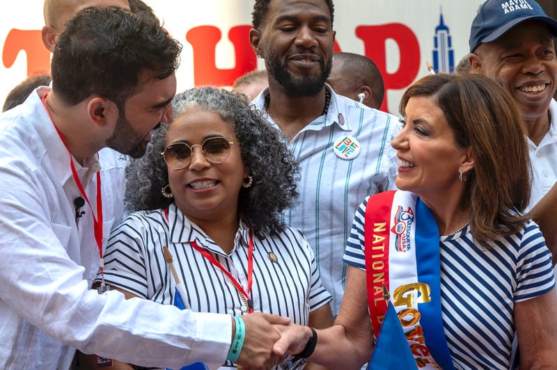 NYC mayoral candidate Zohran Mamdani shakes hands with Gov. Kathy Hochul during the Dominican Day Parade on Sixth Avenue on Aug. 10, 2025