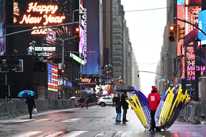 Workers prepare Monday for the New Year's Eve ball drop in Times Square. Brutal cold is expected for the 2026 countdown