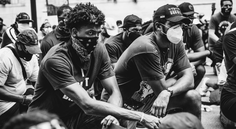 Matisse Thybulle and Tobias Harris of the 76ers protesting in Philadelphia.