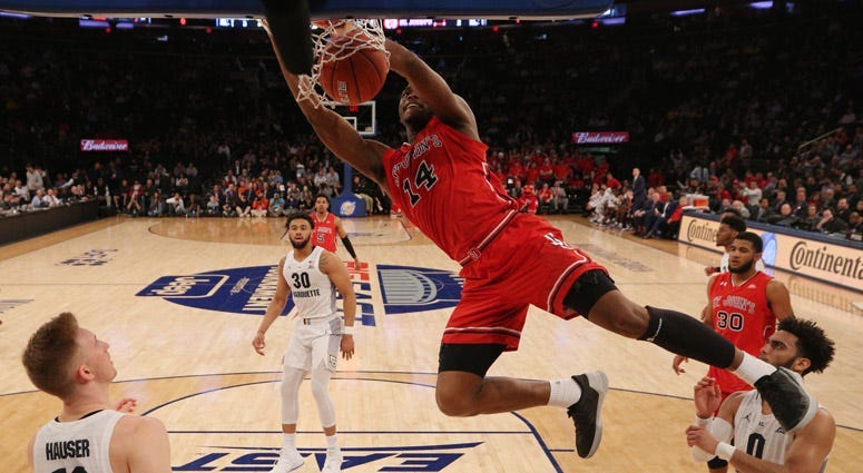 St. John's guard Mustapha Heron dunks against Marquette during a quarterfinal game of the Big East conference tournament on March 14, 2019, at Madison Square Garden.