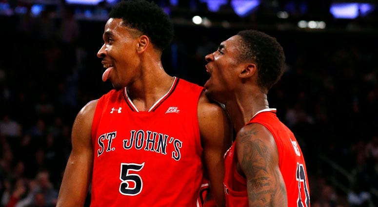 St. John's guard Shamorie Ponds (2) and forward Marvin Clark II celebrate during against Georgetown in the Big East tournament on March 8, 2018, at Madison Square Garden.