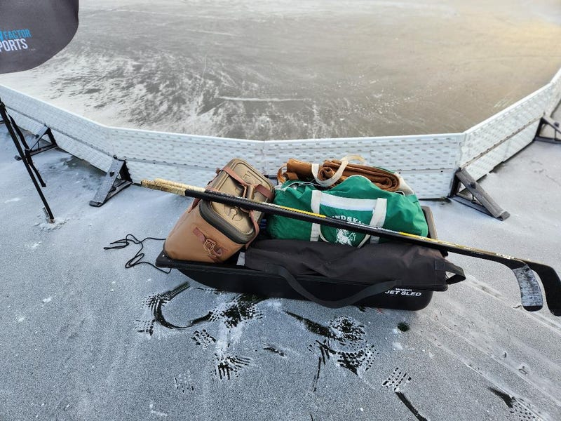 Sled with hockey stuff