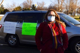 Nancy Reynoza organized a protest in solidarity with Smithfield Food, Inc. employees after many workers complained of unsafe working conditions due to the COVID-19 outbreak in Sioux Falls, S.D. (Erin Bormett/The Argus Leader via AP)