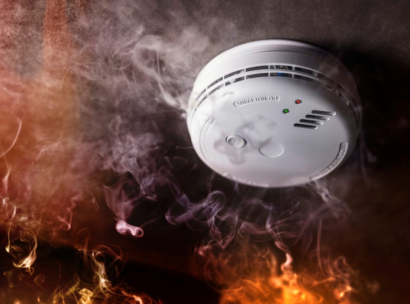 smoke detector with flames beneath
