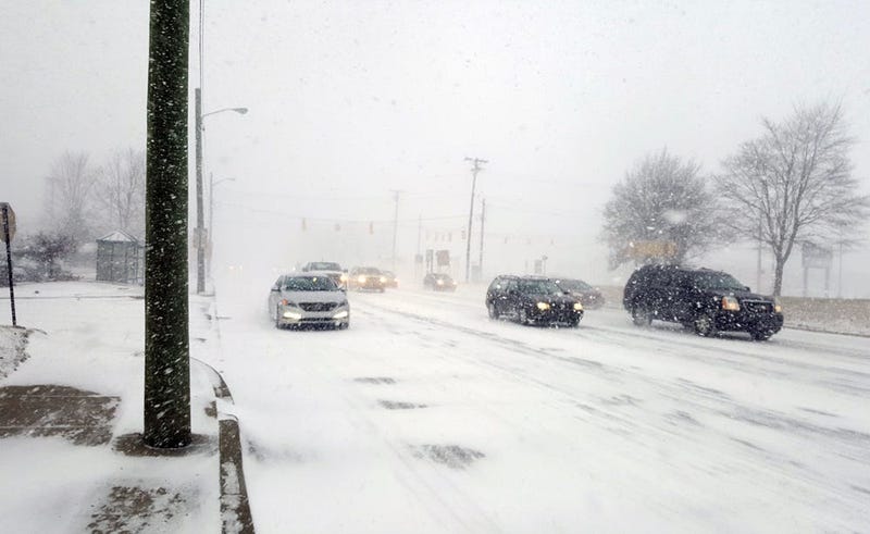 snowing roads driving