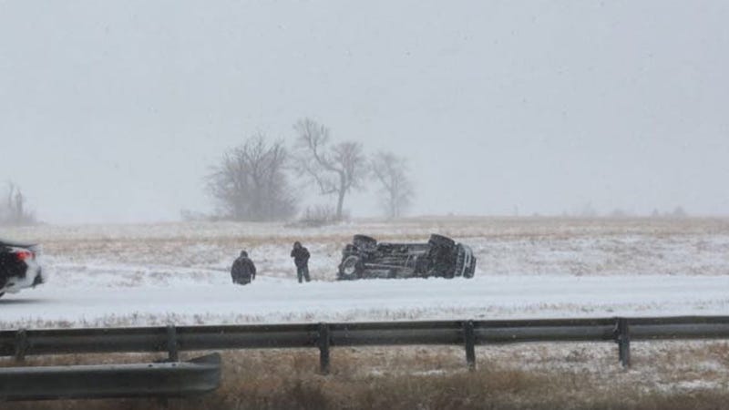 People stranded next to overturned car near Gardner, Kansas