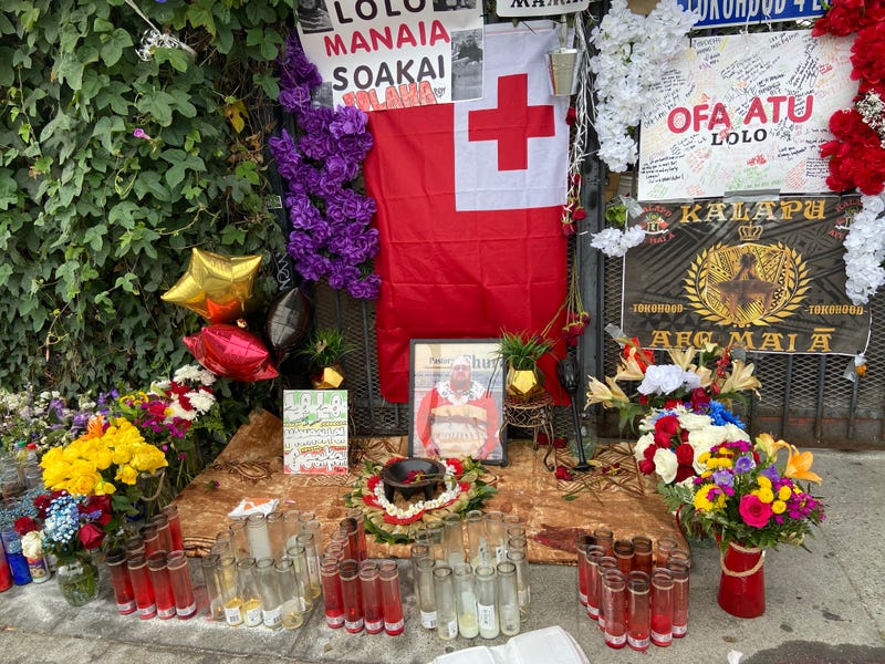 A memorial to Lolomanaia “Lolo” Soakai, 28, at the East Oakland intersection where he was killed in a high-speed crash early Sunday. 