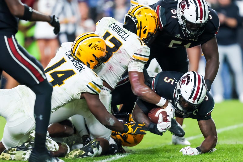 Nov 16, 2024; Columbia, South Carolina, USA; South Carolina Gamecocks running back Raheim Sanders (5) rushes for the game-winning touchdown with 15 seconds left in the game against the Missouri Tigers in the fourth quarter at Williams-Brice Stadium. Mandatory Credit: Jeff Blake-Imagn Images