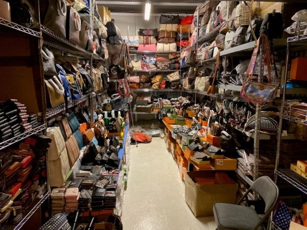 Shelves were packed with fake luxury clothes and handbags