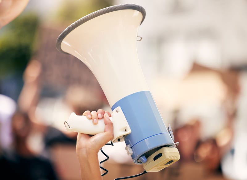 megaphone held by hand at rally