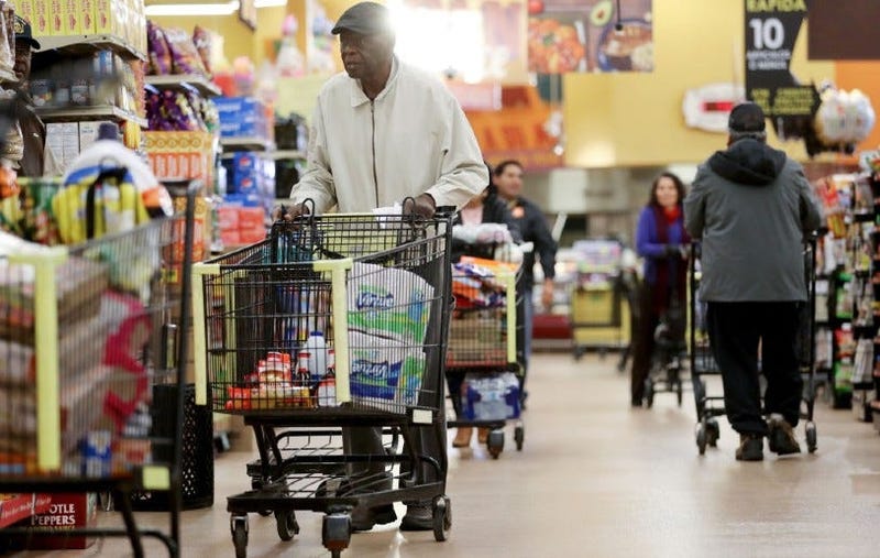Seniors shop for groceries during special hours open to seniors and the disabled. 