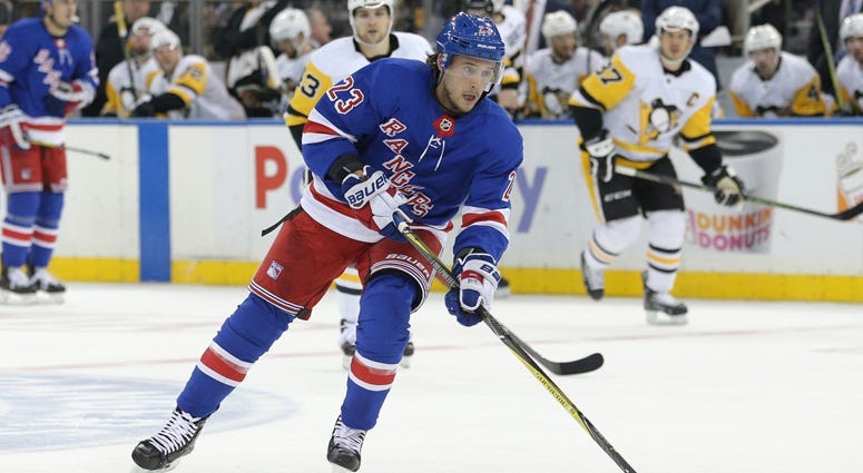 Rangers forward Ryan Spooner (23)