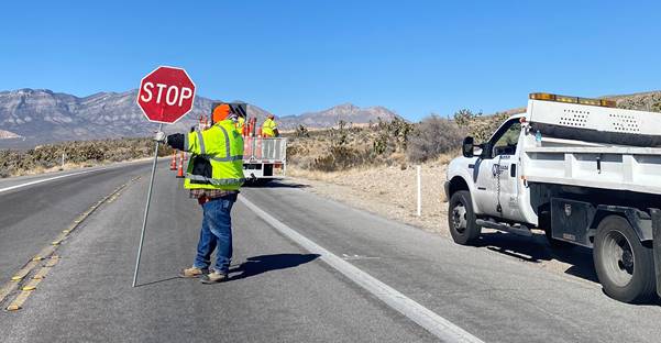 N-Dot Shot of road crew working along SR 159