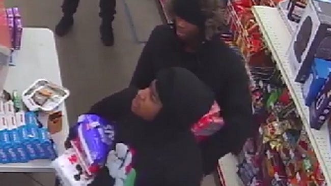 Man in Santa hoodie, accomplice on the run after armed robbery at Family Dollar on Detroit's west side [PHOTOS]