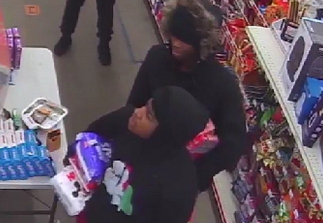 Police are on the hunt for two suspects accused of committing an armed robbery in Detroit on Friday, one of which was wearing a holiday-inspired hoodie during the alleged incident that will hopefully make him easy identify.