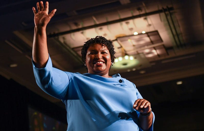 Democratic Georgia gubernatorial candidate Stacey Abrams addresses the crowd in the early morning hours on Wednesday morning at the Hyatt Regency Hotel in downtown Atlanta, GA