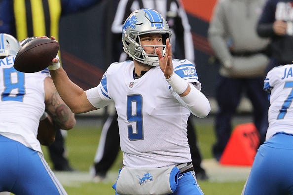Matthew Stafford fires a pass downfield for the Lions