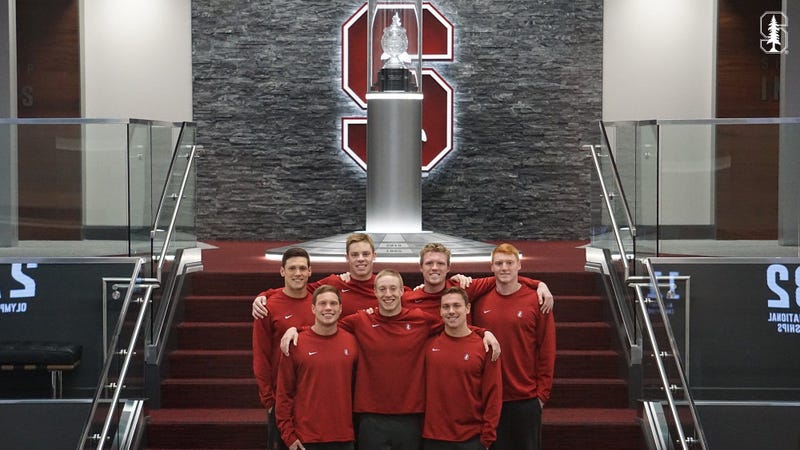 Stanford men's swim team graduates including Abrahm Devine, who says he was not invited back to train because he is openly gay