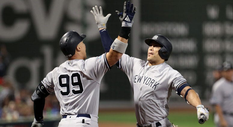 Oct 3, 2018; Yankees Aaron Judge and Giancarlo Stanton celebrate during the sixth inning against the Oakland Athletics in the 2018 American League wild card playoff baseball game. Brad Penner-USA TODAY Sports