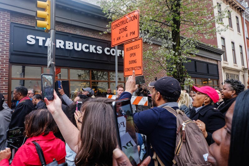 Protesters surround the Rittenhouse Starbucks store on April 16, 2018, where two Black men were wrongfully arrested.