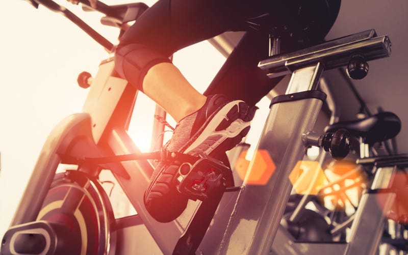 A person riding a stationary bicycle