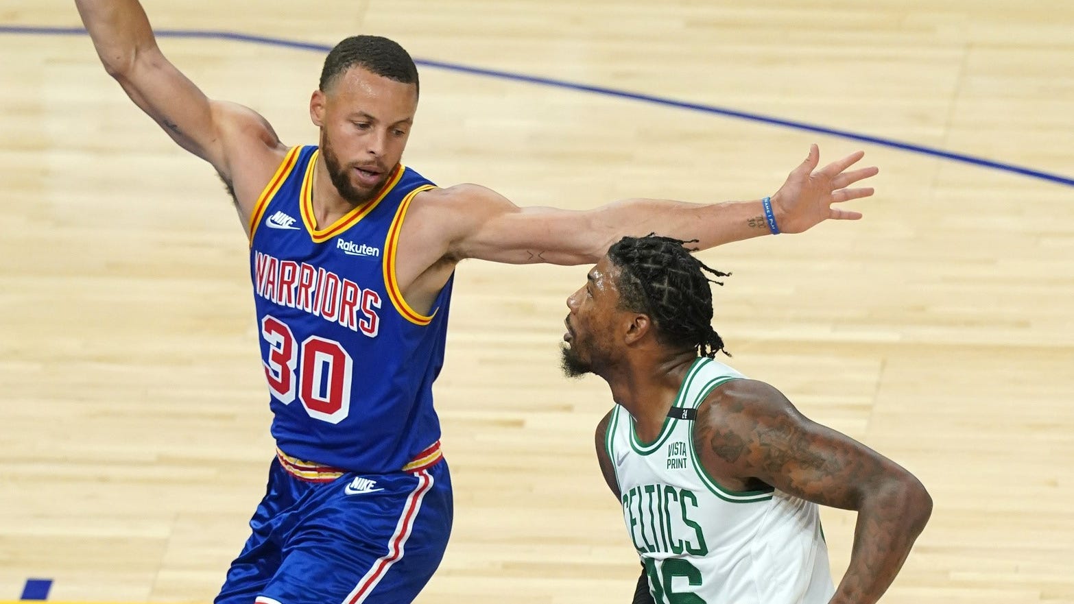 Steph Curry, Moses Moody suffer injuries in loss to Celtics