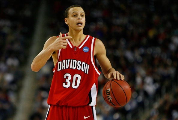 Steph Curry brings the ball up for Davidson in 2008.